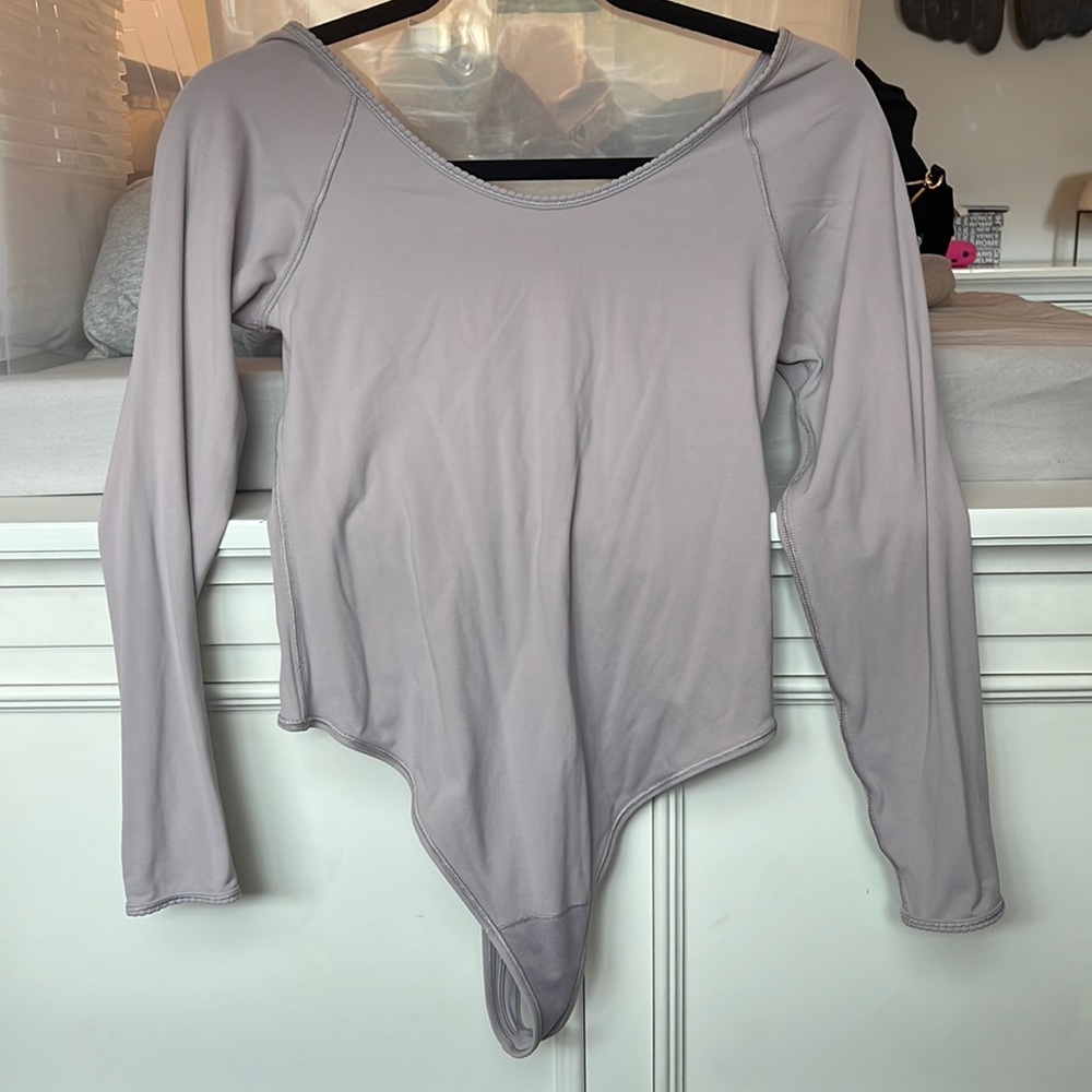 Lululemon bodysuit. Size 8. Worn a couple of times. Lilac in colour
